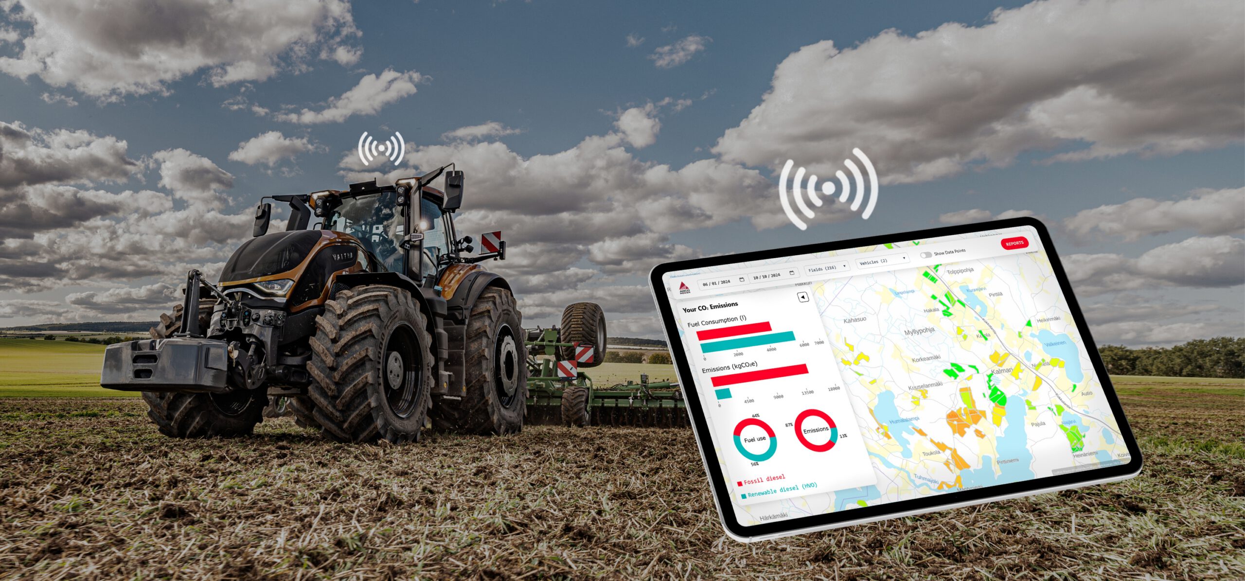 In the foreground is a carbon dioxide display showing the carbon footprint of the fuel type and the use of agricultural machinery. In the background is a Valtra S Series tractor.